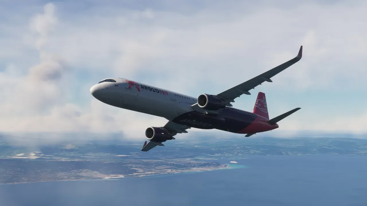 Axolojet Airbus A321 climbing over the coast