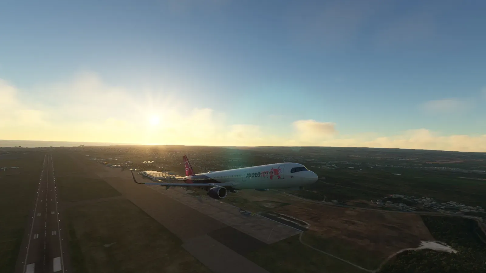 Axolojet Airbus A321 taking off at sunrise